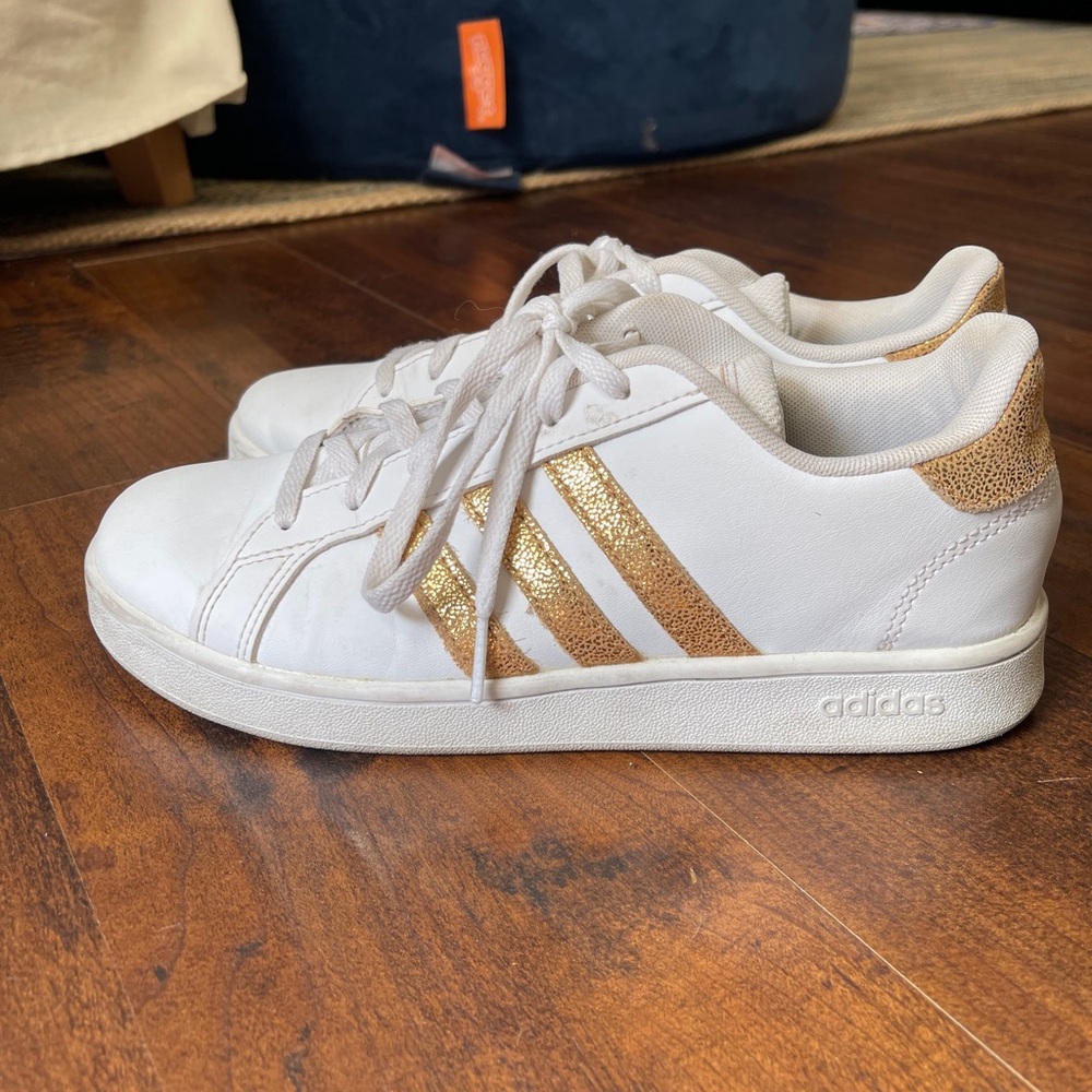 Adidas White Sneakers with Gold Accents